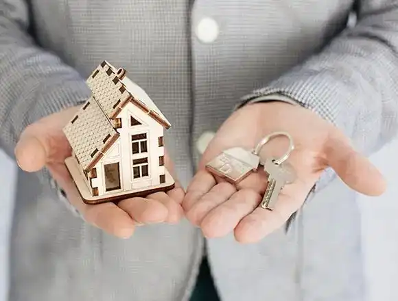 property-handover-keys Декоративно изображение, свързано с услуги за недвижими имоти